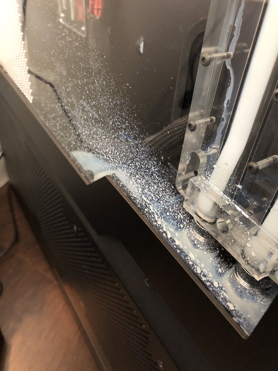AlexMandel's tweet photo. F*CK!! I was using my @DigitalStormPC and heard something pop. The liquid cooling fluid just dumped inside the computer! 🤦🏻‍♂️ https://t.co/kdCWnyenHH