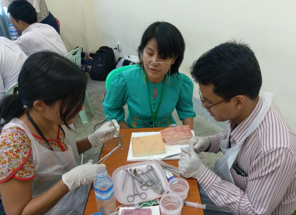 RichardPerryNZ's tweet photo. ASSET-Myanmar Director Dr Shwe Sin Myint overseeing suturing @RACSurgeons NOGH, Yangon https://t.co/5q9dDAWfQf