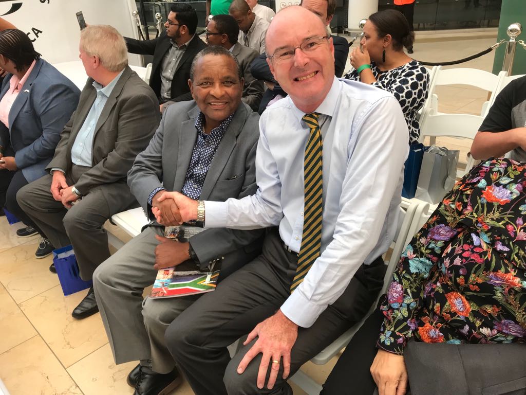 AuHCSouthAfrica's tweet photo. With fellow #Queensbatonrelayveteran #Sascocpresident #GideonSam at the launch of the @TeamSA18 uniform for the #Goldcoast #CommonwealthGames2018 - the uniforms were selected by the athletes themselves @GC2018 https://t.co/NNp8SoIBth