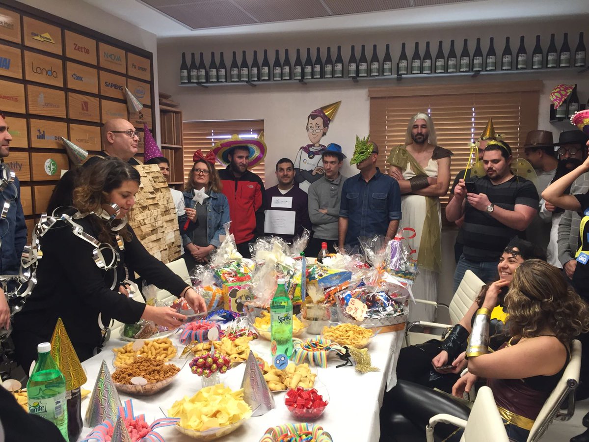 CodeValue's tweet image. Purim gone wild at #CodeValue! And the best part is that we got to donate sweet packages that were exchanged between co-workers to the children at Meir Hospital and children at risk.