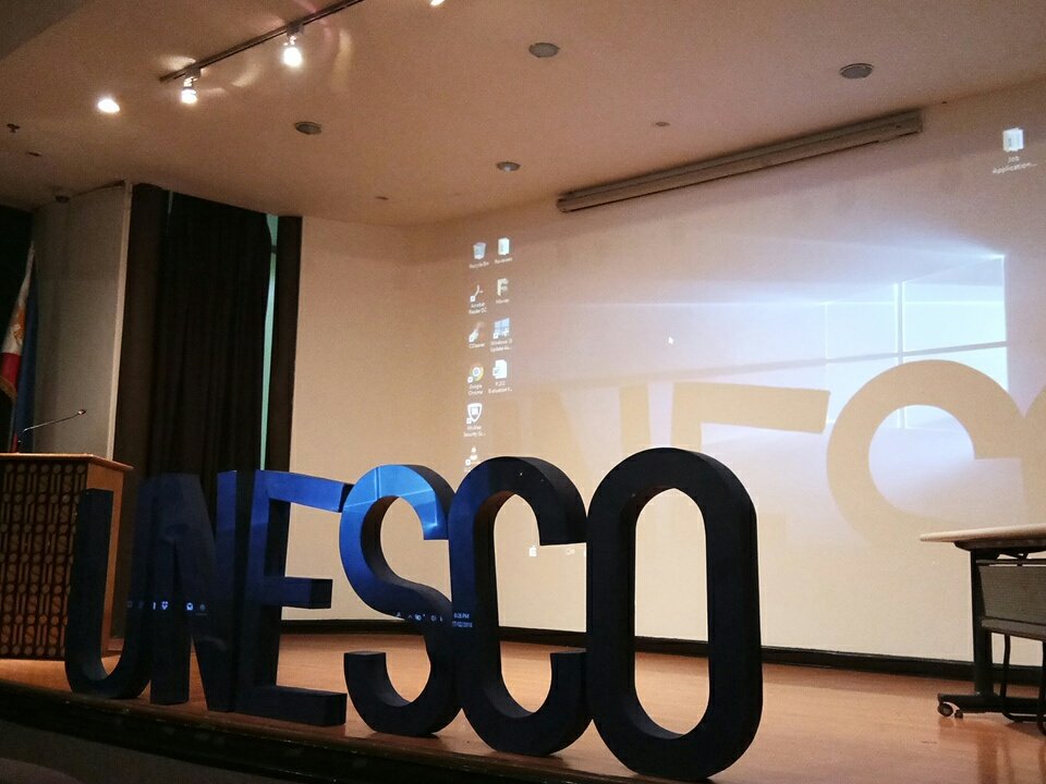 ust_sbma's tweet photo. Happening Now: 
"Touchdown: A Journey to UST UNESCO's BIGGEST REVEAL"  at the TARC Auditorium 

#Touchdown2018 
#SBMAboveLimits https://t.co/g7x0bAwa84