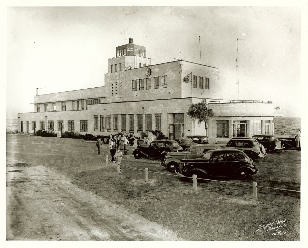 TampaBayHistory's tweet photo. #OTD in 1939, this photograph was taken of the Peter O. Knight Airport facade of the Adminstrative building and parking lot, Davis Islands, Tampa, FL. https://t.co/khBn2sJPj9