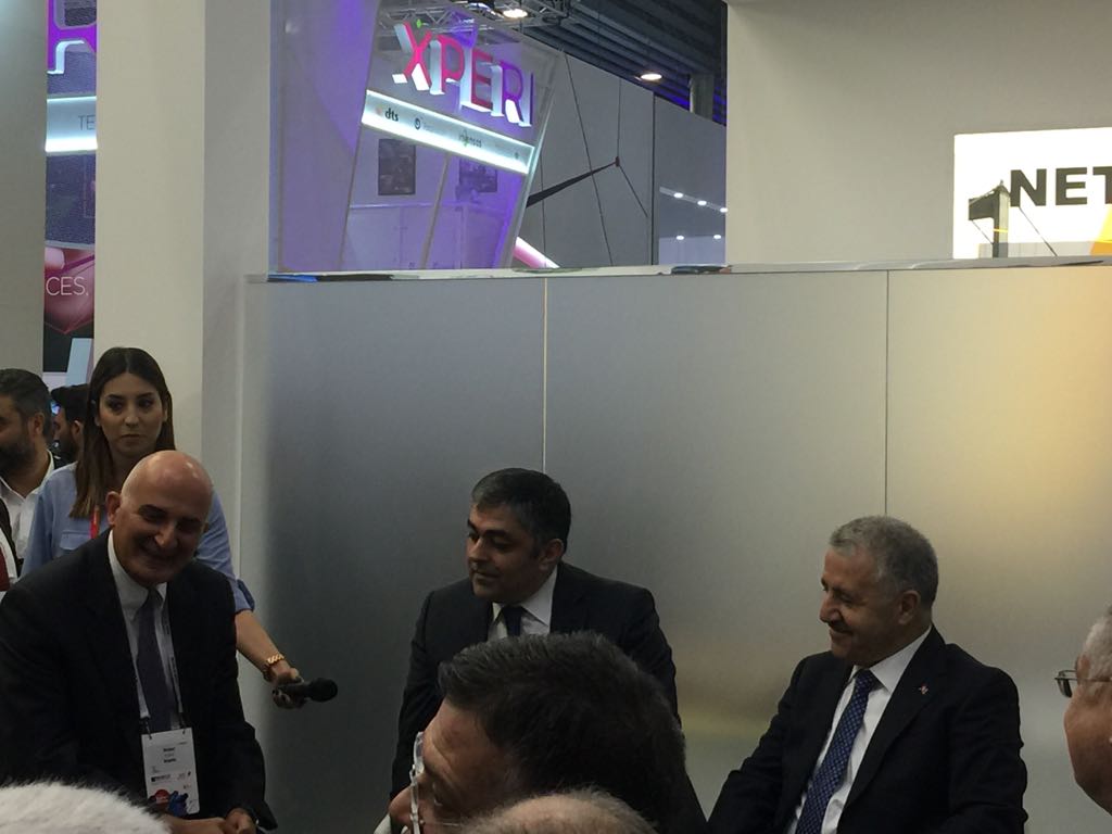 Argela's tweet photo. Turkey's Minister of Transport, Maritime Affairs and Communications, Mr. Ahmet Arslan visited Netsia's stand @MWC2018. During Minister Aslan's visit, #Netsia's RAN slicing product #ProgRAN was demonstrated. https://t.co/6c2DkVA91Y