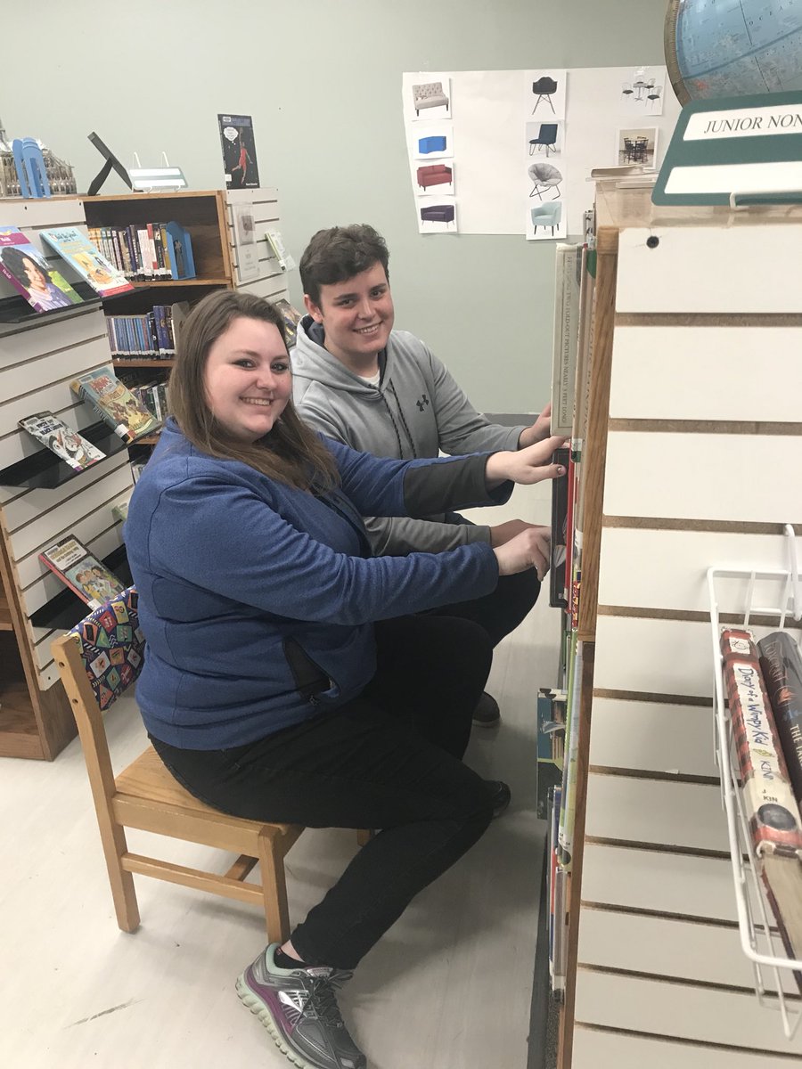 Abby and Noah are reading the collection on service day! <a href="/fccrickets/">Fall Creek School District</a> #gocrickets
