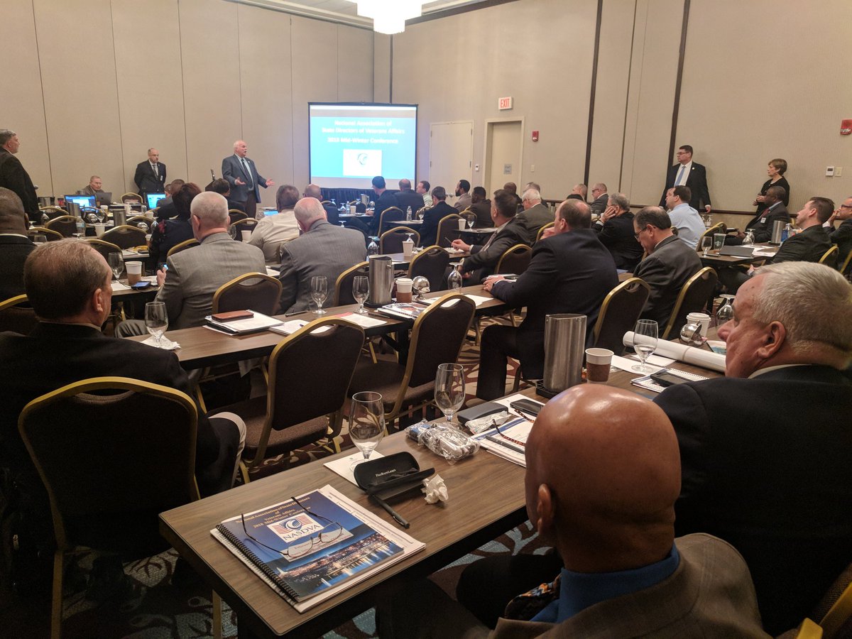 Urena's tweet image. Randy Reeves, Under Secretary for @VANatCemeteries Memorial Affairs addresses the National Association of State Directors of Veterans Affairs #NASDVA #MidWinterCon. Prior to his role, he served as State Director to Mississippi as well Association President @NASDVAPres 2016-2017.