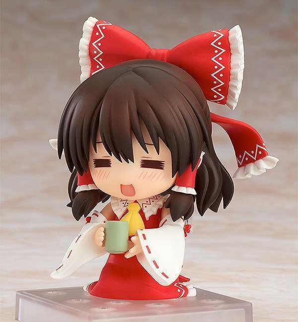 SHOUJOB0X's tweet photo. Did you know that our beloved priestess got a re-release of her #Nendoroid last December? This version of #ReimuHakurei comes with more expressive faceplates and props that rightfully cosplay the range of her cuteness! #Touhou https://t.co/sq1yzC0Bvv