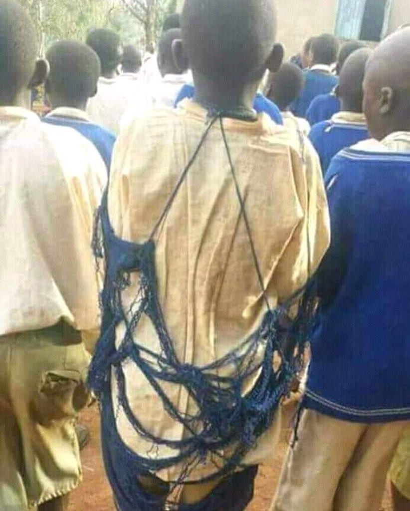 KenMijungu's tweet photo. This is extremely sad. Poverty is painful. Anyone knows this pupil and where the school is? Who took the photo? I would like to buy him complete uniform. https://t.co/fphLLjR60T