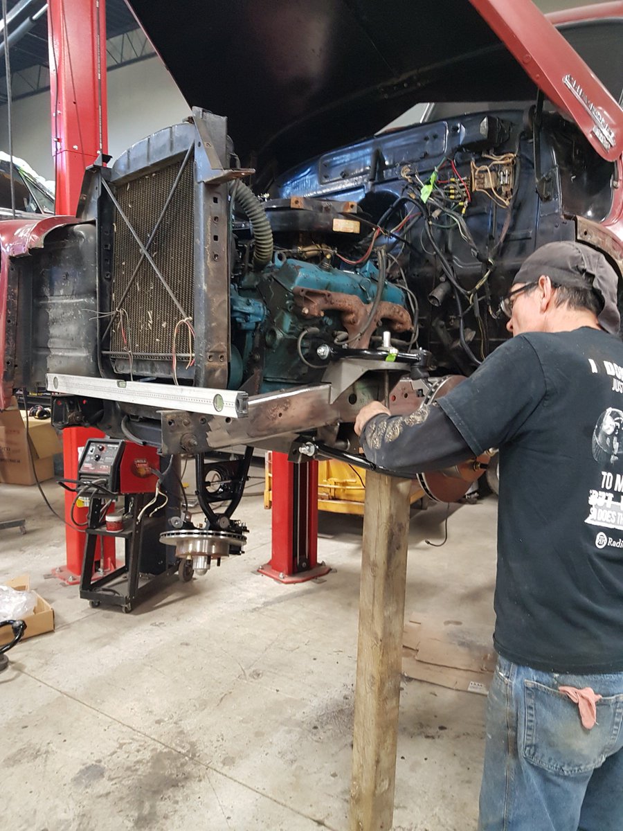 RadicalRods's tweet photo. Larry " hot rod " Hughes getting the new front suspension in place on another 50 Chevy pick up https://t.co/xB5org2mBq