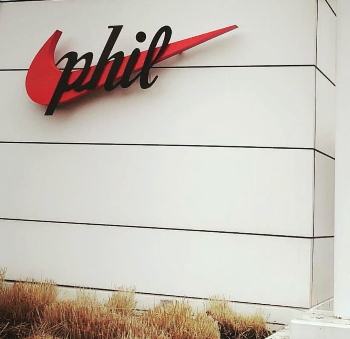 darrenrovell's tweet photo. For Phil Knight’s 80th birthday, the Nike campus changed some Nike signs to Phil, handed out Phil T-shirts https://t.co/grn7mgJeyG
