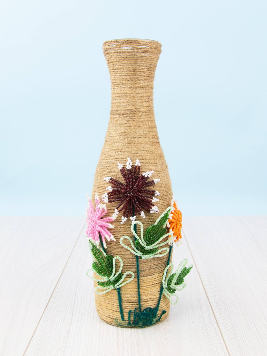 BlackSeaCraft's tweet photo. This is my small contribution to saving the environment - recycled bottle vase. 

#recycled #upcycled #saveenvironment #jutevase #twinevase #rusticvase #recycledbottle #ropewrappedvase #wrappedvase #handmade #ooak #esty #frenchbeaded #seedbeaded https://t.co/P5dpZdfUhS https://t.co/4qbeSw2MSh