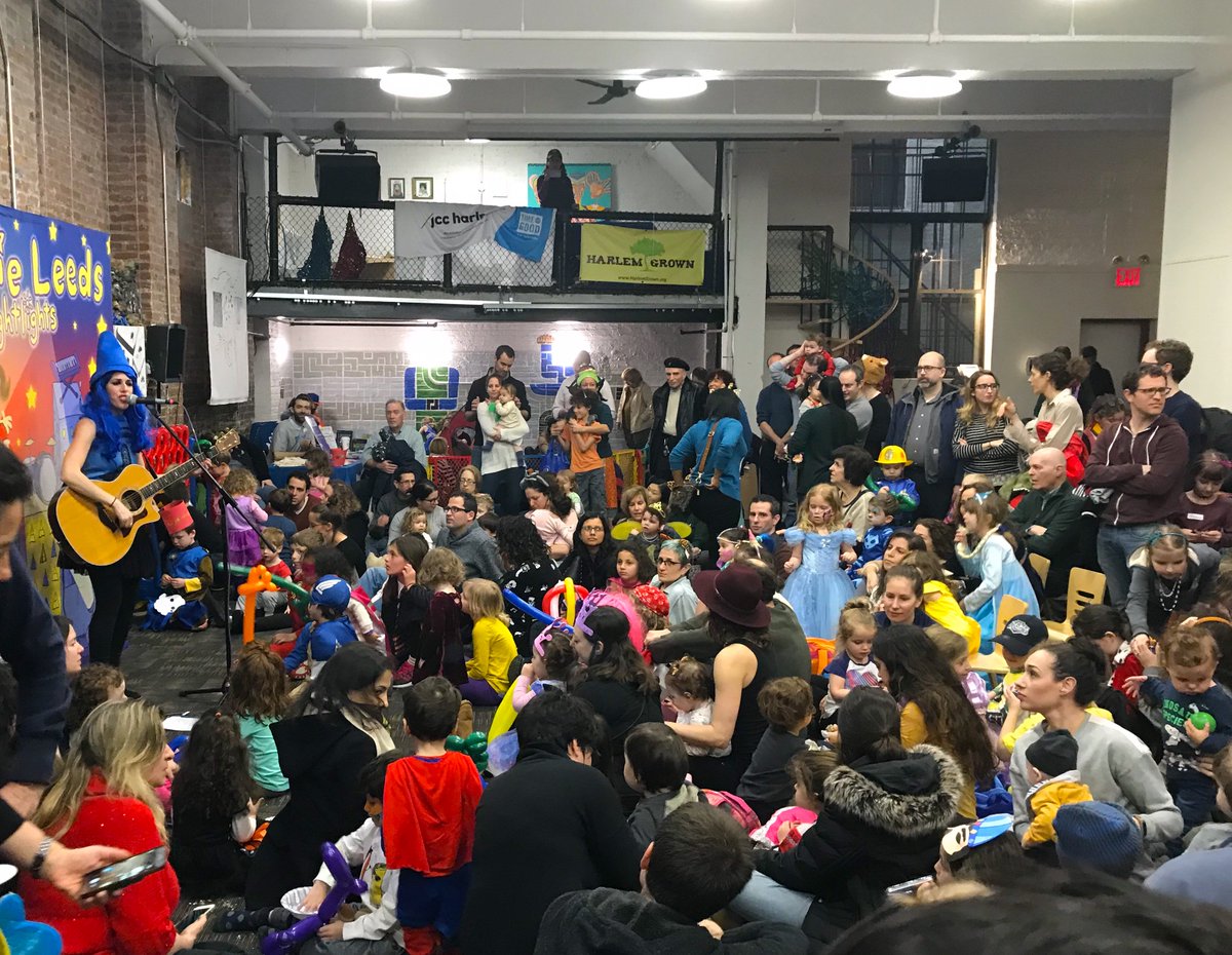 joanieleeds's tweet photo. Standing room only at the AWESOME #PURIM event at #harlemjcc with @PJLibrary this past weekend. Did you notice my #BlueCrayon hat resembles the hat of a certain someone? #meshugas #harlem #fullhouse #purim2018 #haman https://t.co/uAphaUFCrO