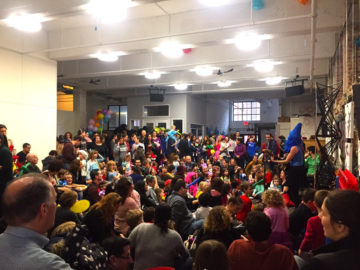 joanieleeds's tweet photo. Standing room only at the AWESOME #PURIM event at #harlemjcc with @PJLibrary this past weekend. Did you notice my #BlueCrayon hat resembles the hat of a certain someone? #meshugas #harlem #fullhouse #purim2018 #haman https://t.co/uAphaUFCrO
