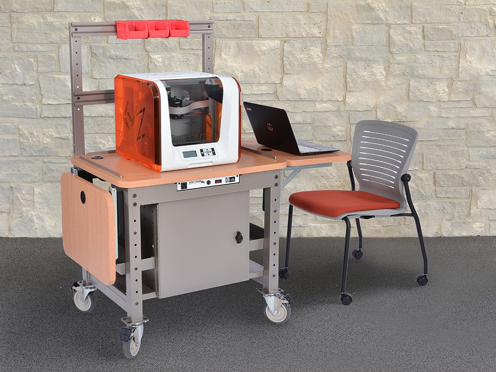 Bluum_EdTech's tweet photo. What’s new with @spectrumind? Ask us about the mobile &amp; rugged 3D2GO Printer Cart. It is a spacious worksurface that fits the most popular 3D printers. Visit #Troxell Booths #931/933 at #NCTIES18! #edtech https://t.co/GoevacBB8m
