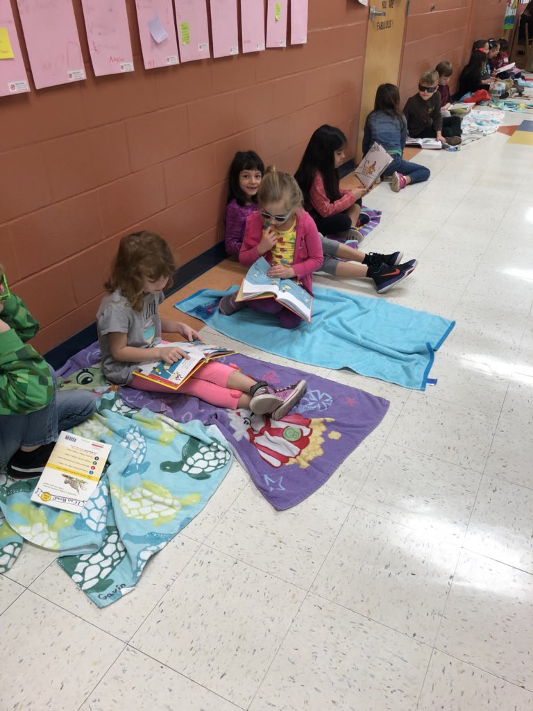 SalasRdg's tweet photo. The sun didn’t shine on our reading fun in the sun day, but we still had fun reading! @WardWranglers #ReadAcrossAmericaWeek https://t.co/ImpjH7wBXa