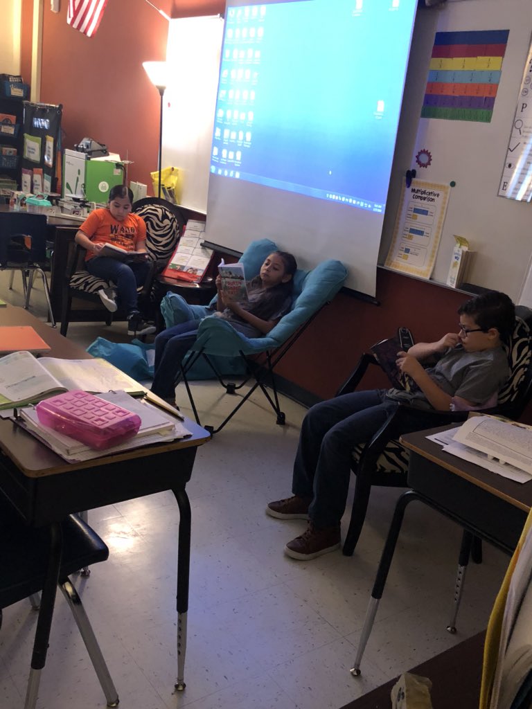SalasRdg's tweet photo. The sun didn’t shine on our reading fun in the sun day, but we still had fun reading! @WardWranglers #ReadAcrossAmericaWeek https://t.co/ImpjH7wBXa
