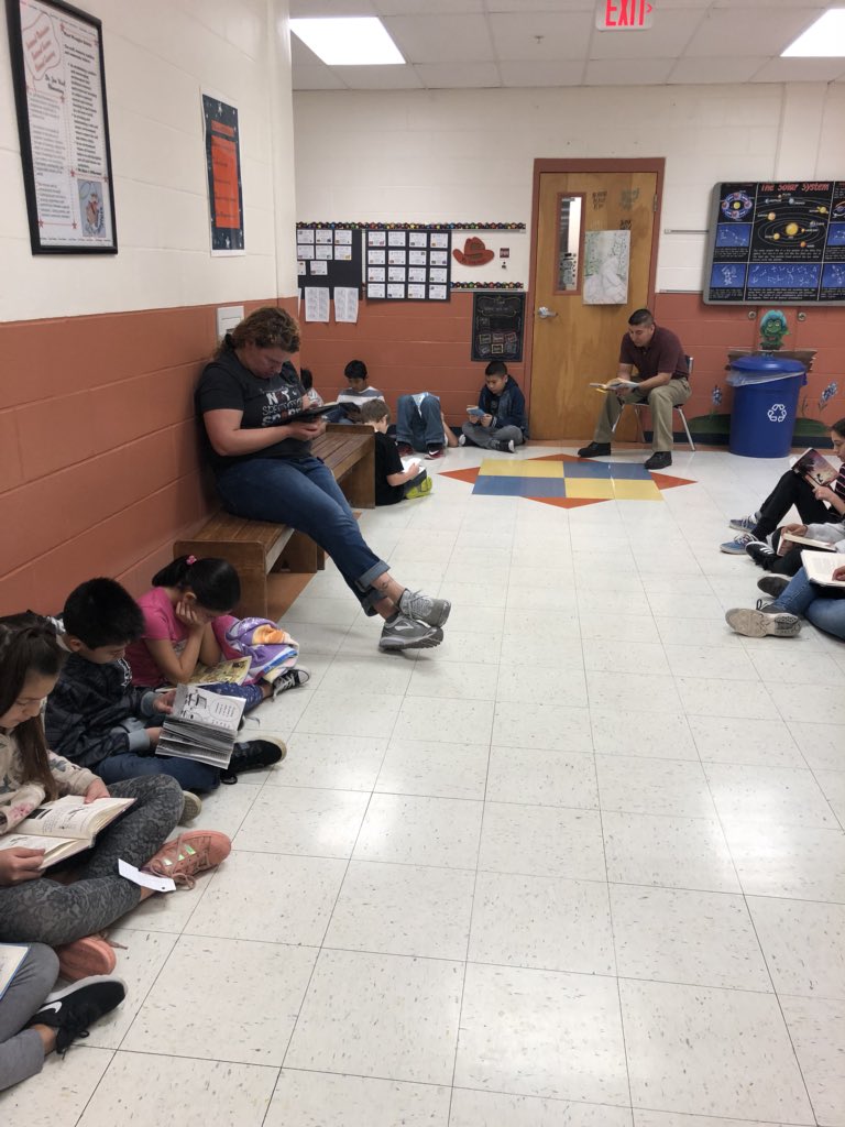 SalasRdg's tweet photo. The sun didn’t shine on our reading fun in the sun day, but we still had fun reading! @WardWranglers #ReadAcrossAmericaWeek https://t.co/ImpjH7wBXa