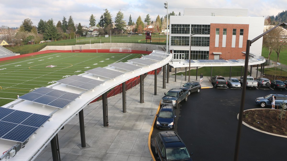 ppsoperations's tweet photo. Solar panels have been installed on the walkway between the historic 1915 building and the new gym at Franklin High School. https://t.co/jGDF7sHFbK
