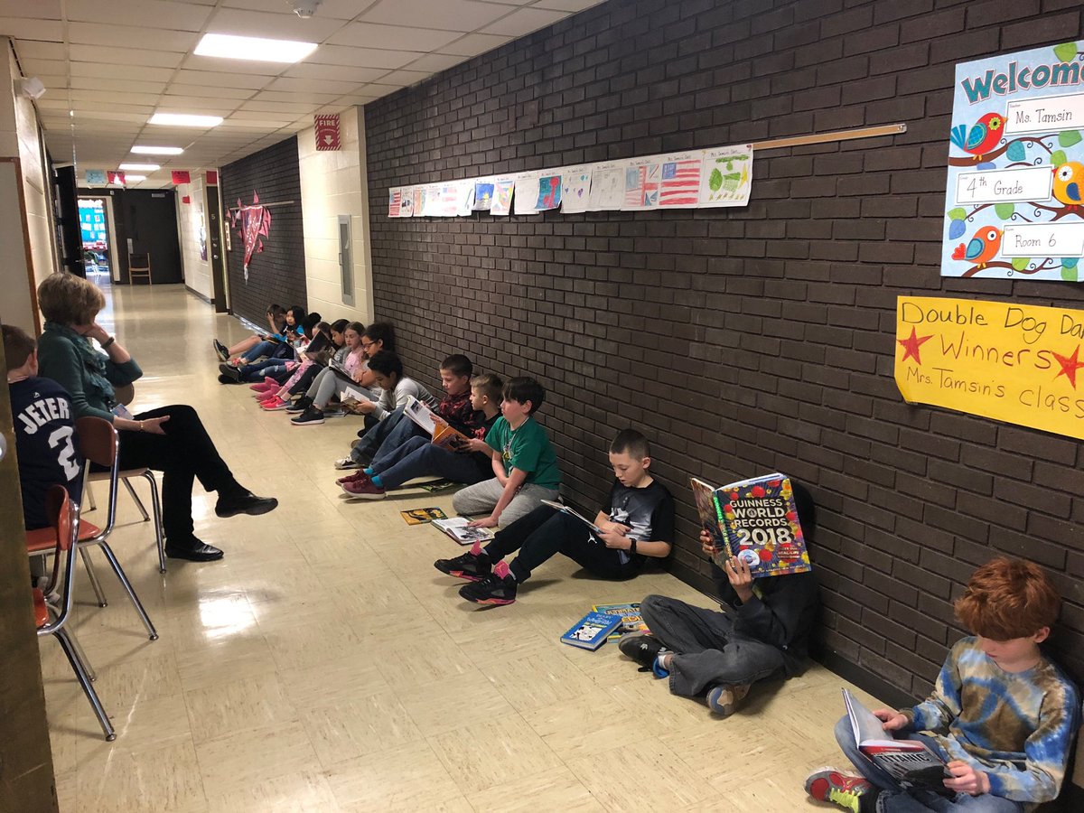 MPS_Martin's tweet photo. Mrs. Tamsin's class is rocking #ReadAcrossAmerica2018 in the hallway! @mpspride #MartyReads #MartinReads https://t.co/Q4PM8SxeB8