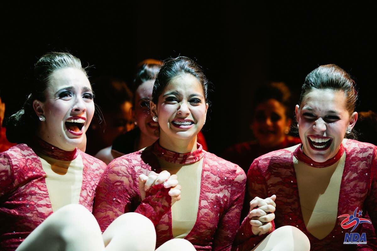 NDAKate's tweet photo. That moment you find out you’re NATIONAL CHAMPIONS!! (P.S. anyone recognize these 3 NDA staffers?! 😊) #NDAnationals 🏆👯‍♀️💕 https://t.co/pL8Cz32lbx