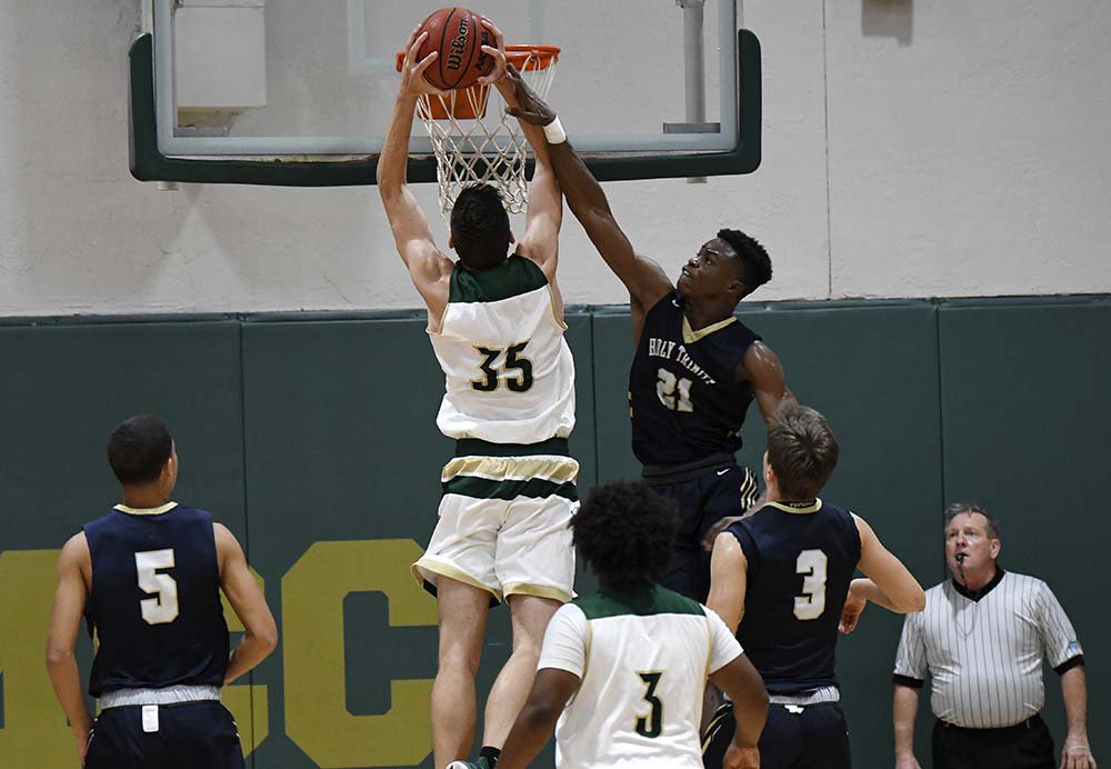 The Melbourne Central Catholic Hustlers defeated crosstown rival Holy Trinity 60-48 to advance to the regional finals in the <a href="/FHSAA/">FHSAA</a> state Class 5A basketball tournament. Take a look at the photo gallery by <a href="/cbphoto1/">Craig Bailey</a> ow.ly/MfKn30iF0ZL