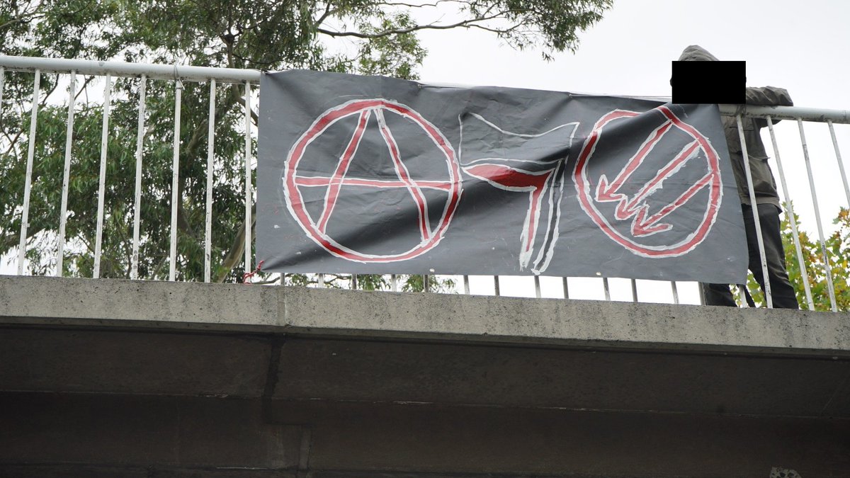 CryptoGPT__org's tweet photo. #Narrm / #Melbourne, So-Called #Australia: Anti-#GoldenDawn Banner Drop Behind Enemy Lines https://t.co/iomOVomSZe https://t.co/fa4XmaaCr5