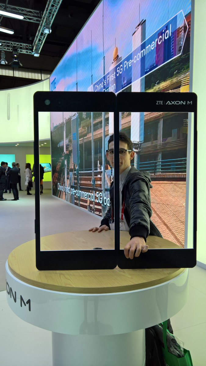 a_bellu's tweet photo. A #phone with TWO screens?? Impossible! #MyZTEAxonM @ZTEDevice @ZTE_UK @zteusa It is actually real at #MWC18 https://t.co/hQzQcwtjO7