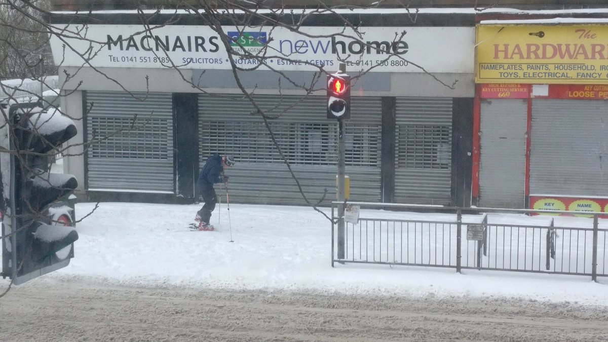 There's a man skiing down Alexandra Parade in Glasgow... 😂