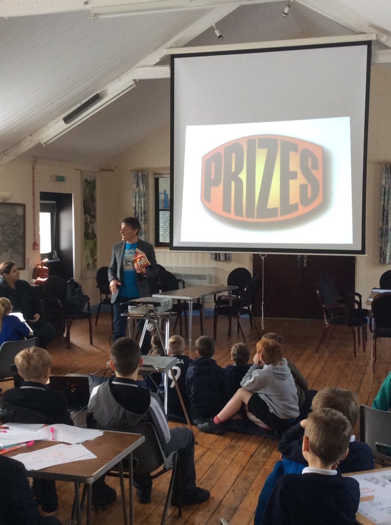 A morning with Andy Cope. Year 7 boys writing group working hard on creative writing after listening to inputs from author Andy Cope