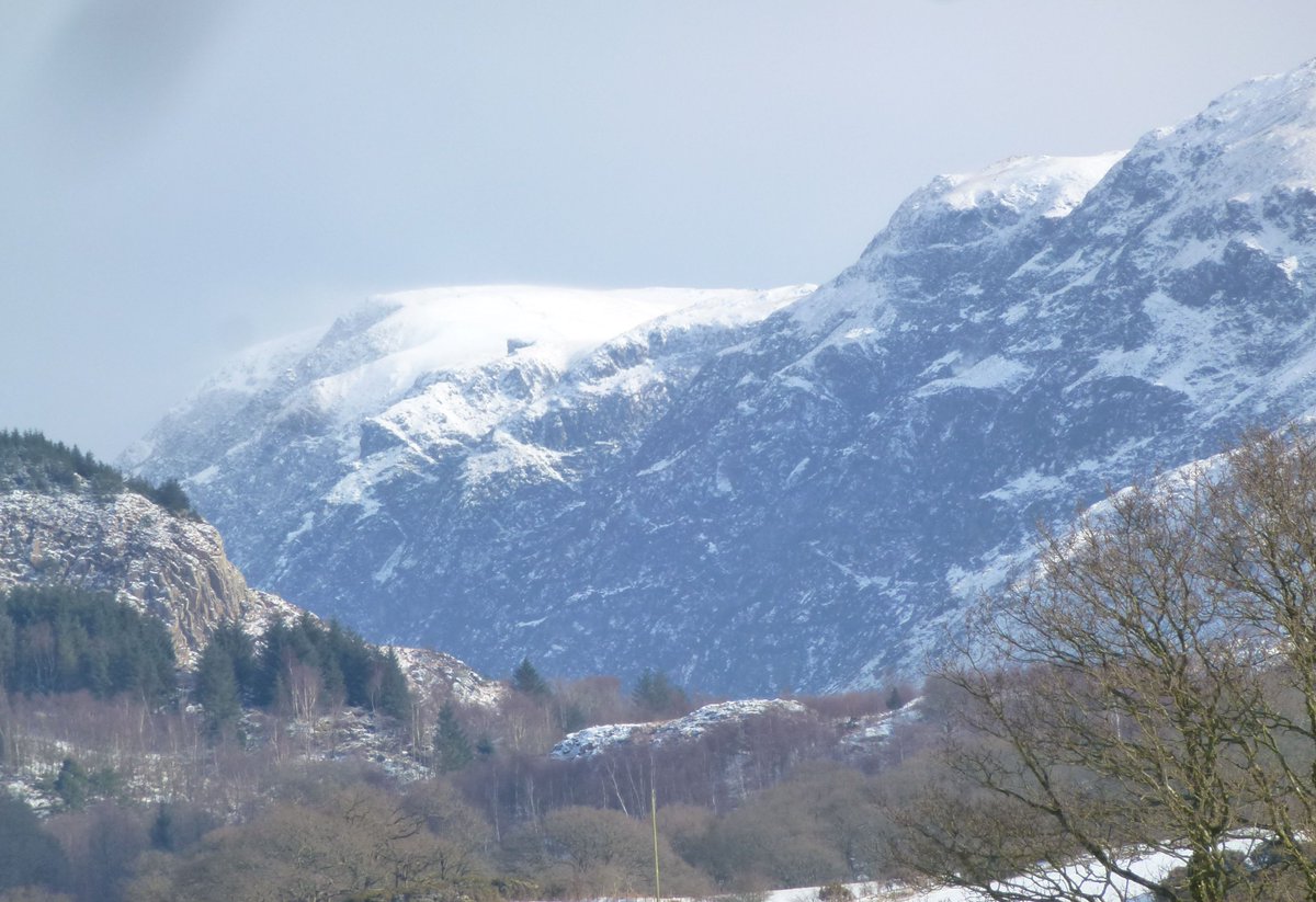 snowy #Wasdale screes greet a weary <a href="/BBCR1/">BBC Radio 1</a> <a href="/gregjames/">Greg James</a> , currently in the clouds (1200 feet higher than this pic), on #scafellpike #PedalToThePeaks - good lad! - worth a donation I reckon #SportRelief