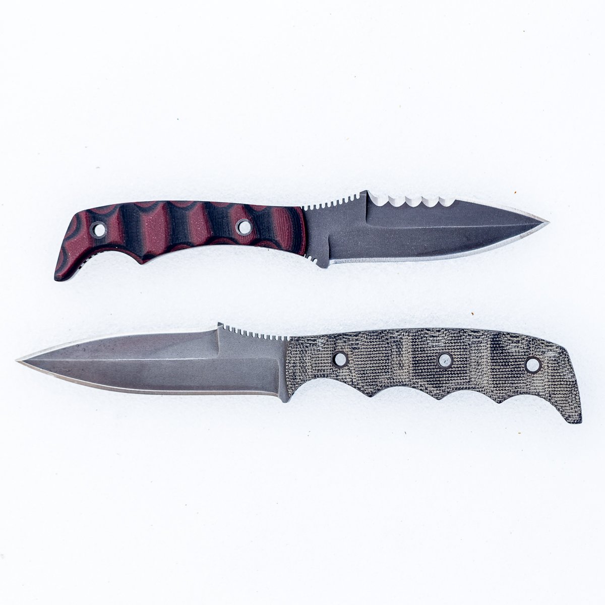 DynamisAlliance's tweet photo. 2 of our primary blades we carry EVERY single day. Razorback: compact with deep back serrations. Dynamis Blade: extremely well rounded for both combat and concealable use. I wonder what blade will join them next? 🤔 #dynamisblade #blade #crusheverything #thewilltofight https://t.co/ZJKeYcimLm