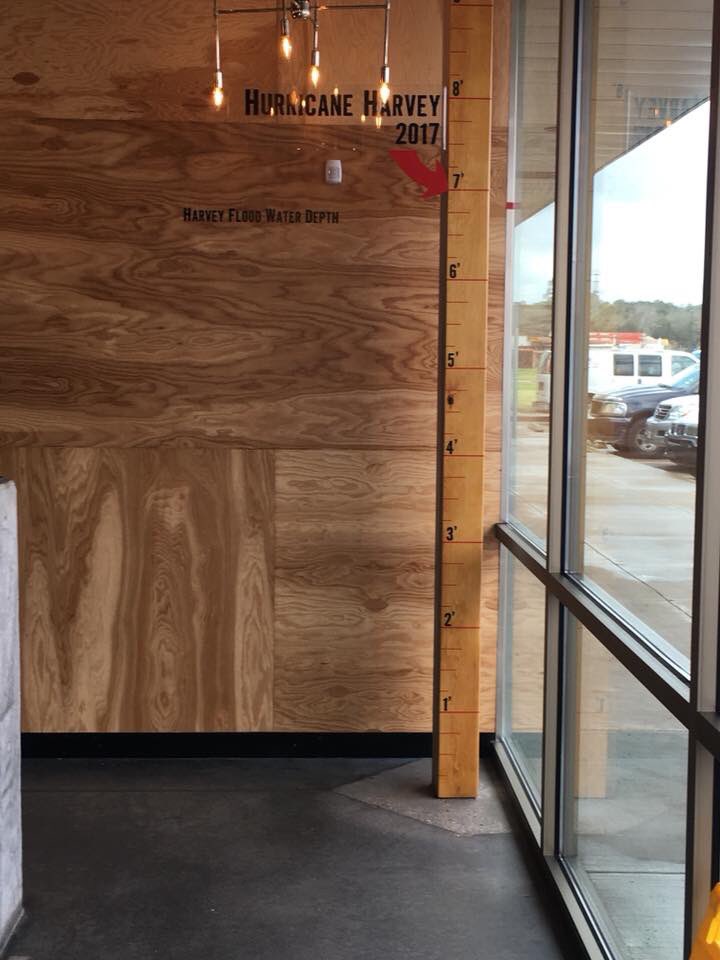 Abbieavamommy's tweet photo. #putitbacktorchys A realtor complained to corporate so Torchy’s in kingwood TX removed flood level sign from Harvey  apparently she is having trouble selling flooded homes because of it. I am for one angry. They flooded and came back and had every right to put the marker up https://t.co/wfWDZ5akKP