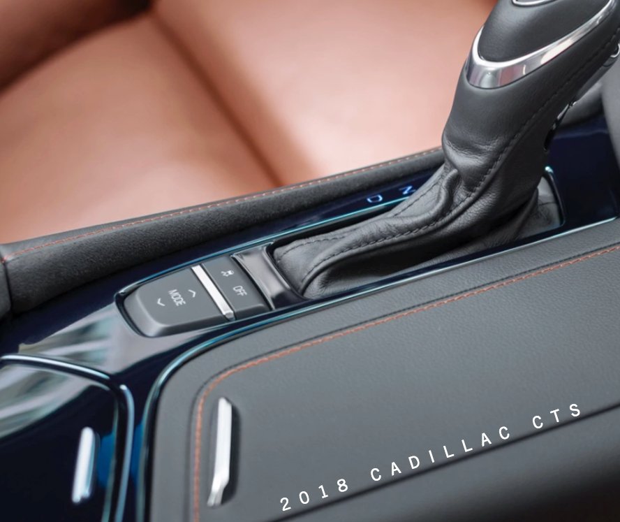 StanMcNabbAuto's tweet photo. A leather-wrapped cover conceals the cup holders in the Cadillac CTS and are automatically revealed with just the tap of your finger. https://t.co/PNRE40dwZc