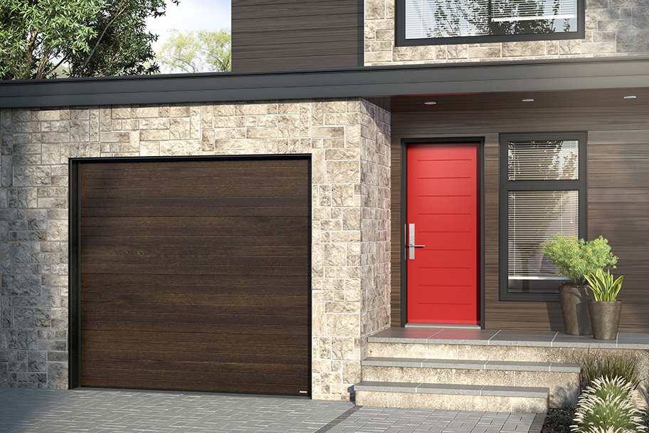 Discover our new garage door colour, Chocolate Walnut. It fantastically imitates wood, without its maintenance, and harmonizes with any house styles. bit.ly/2otFye2