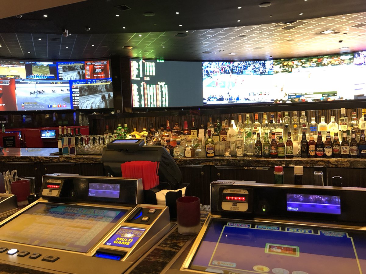 Horses on the left, basketball on front, video poker/slots below and booze across #thisisvegas in the afternoon. But no booze for me (drinks only on evenings)