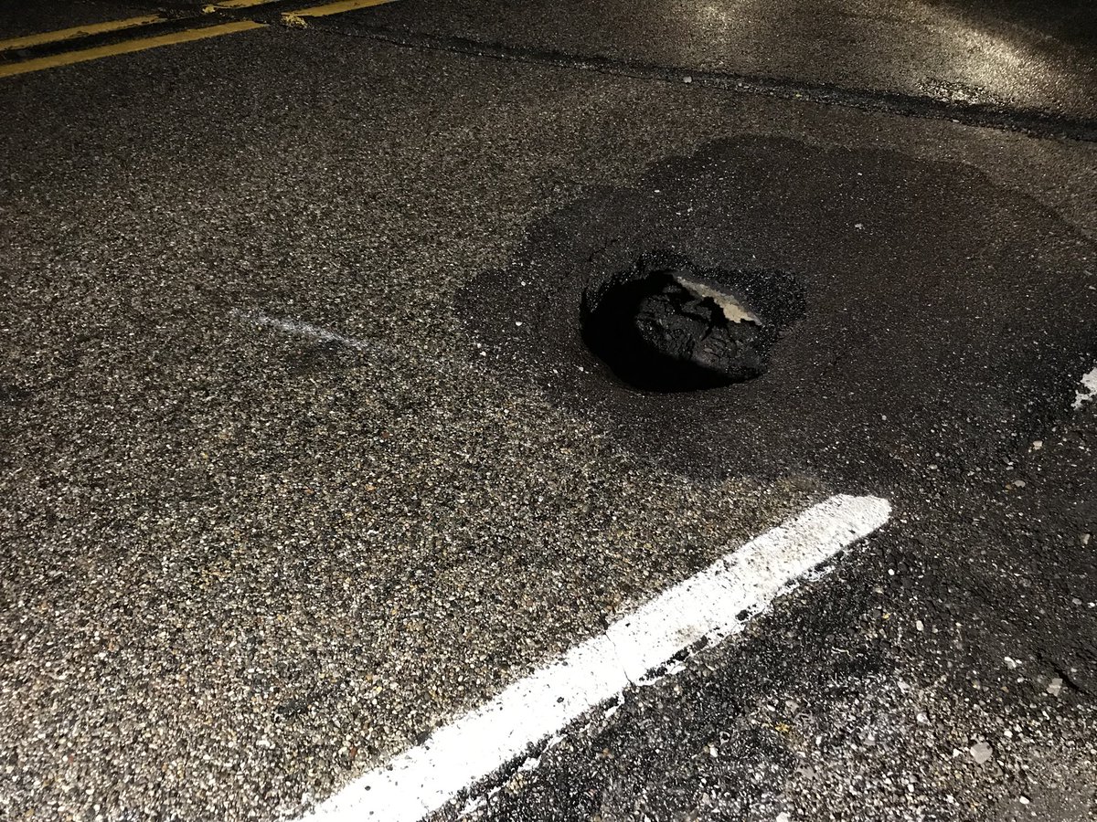 This is the hole that’s opened up on SR168 just east of Owensville in Gibson County. Crews on scene say it’s DEEP.
