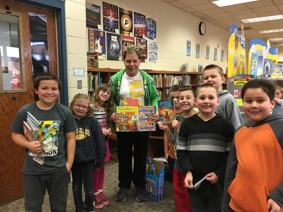 TheLakerEdge's tweet photo. Local celebrity, Travis "Bart" McNall, stopped by Parkside's Book Fair today to sign our school's copy of the Ripley's Believe It or Not book that he's featured in for his Bart Simpson collection!!! 
#lakeredge https://t.co/fvwgJEnD5W