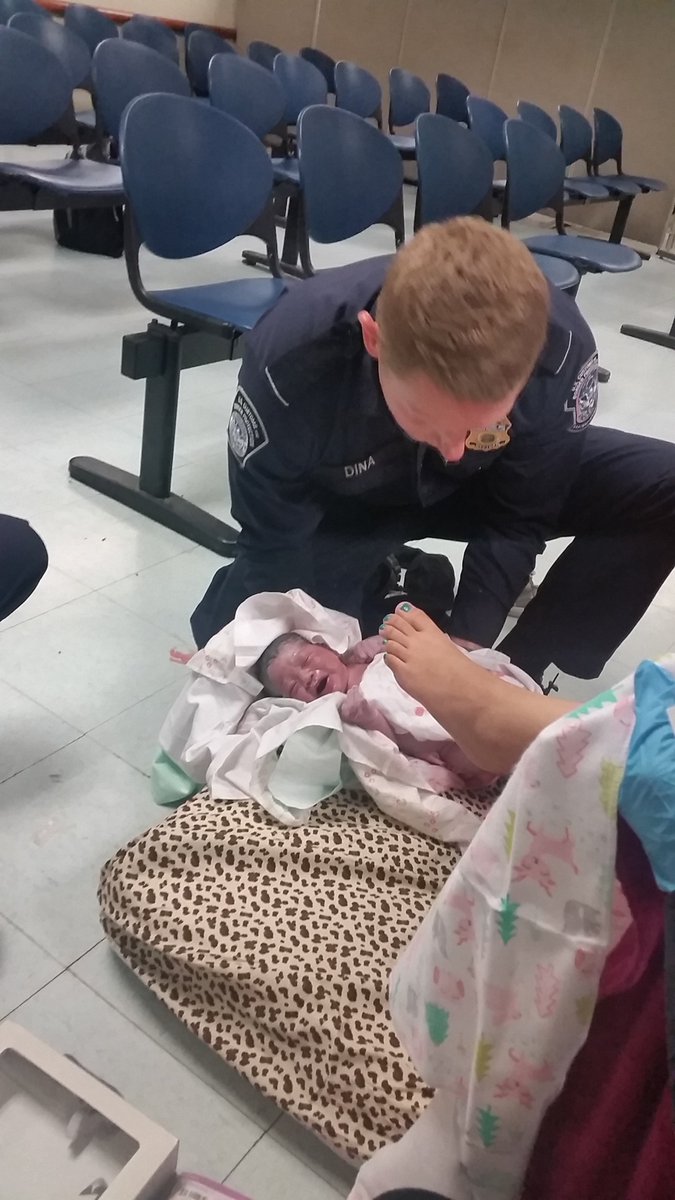 CBP's tweet photo. A baby boy was safely delivered at the Port of Brownsville last week, thanks to the lifesaving skills of #CBP Officer Justin Dina, who used his previous training as a Paramedic to unwrap the umbilical cord from around the newborn’s neck. Mom and Baby are doing well! https://t.co/EMsOrKNjj4