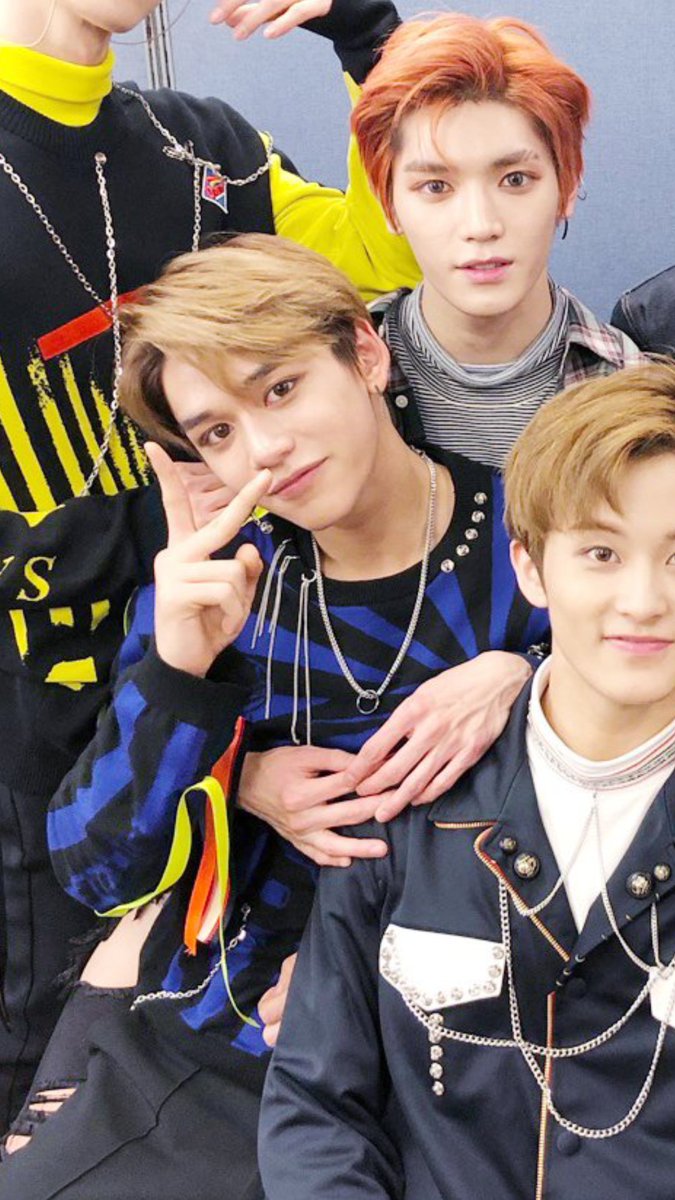 Not totally a Taeyong-Lucas selca together yet but this is the second next best thing.. Taeyong wrapped around Lucas who is sittingon his lap omoooooooooo why so cute you two 