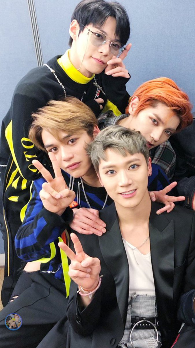 Not totally a Taeyong-Lucas selca together yet but this is the second next best thing.. Taeyong wrapped around Lucas who is sittingon his lap omoooooooooo why so cute you two 