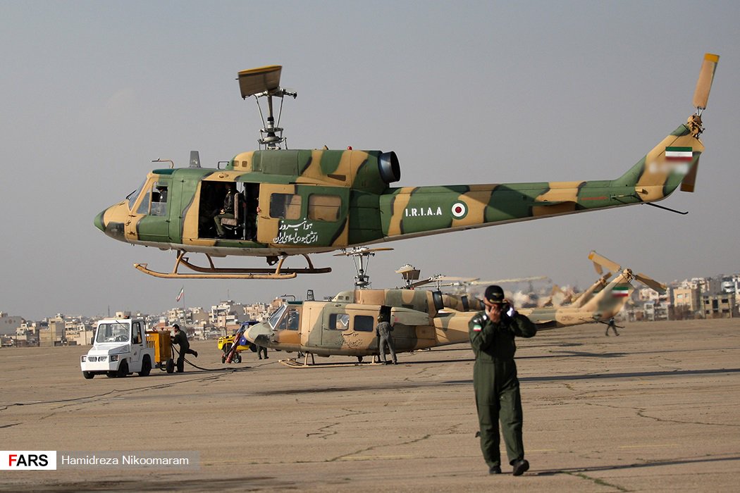 BabakTaghvaee's tweet photo. People are asking why #Iran Army Aviation helicopters are being painted in odd &amp; different colors recently. It is due to overhaul budget cuts which has forced #IRIAA to overhaul helicopters itself instead of sending to #IHSRC. Unlike #IHSRC, #IRIAA painters are low skilled &amp; lazy https://t.co/oDvAYGIGja
