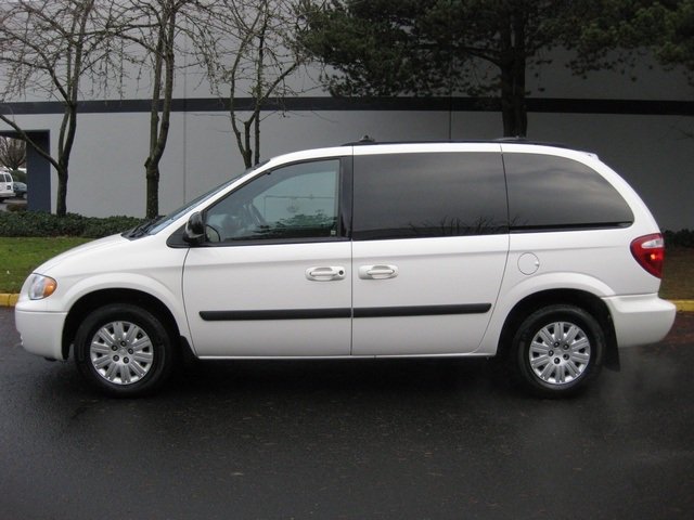NorthPolePD's tweet photo. Stolen from the Safeway parking lot, a 2005 Chrysler Town and Country MiniVan, White in color, Alaska license plate JDF388. Damage along the bottom of the front bumper. RE:18-101. Notify police immediately if located. Photo not actual vehicle. For reference only. https://t.co/DqI9WtWEb0