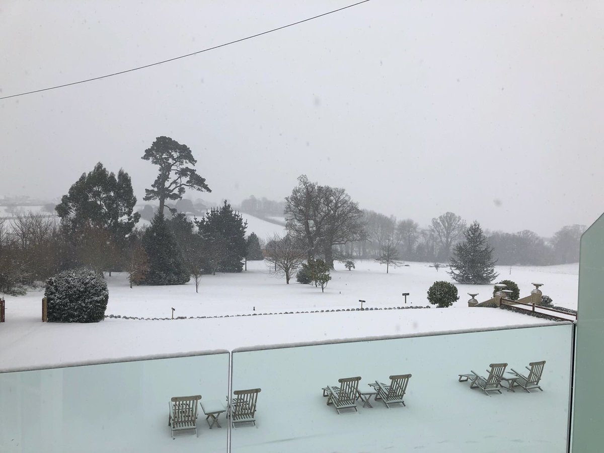 thebellstilton's tweet photo. @michaelcaines @Lympstone_Manor @ktg777 What an incredible start to Jo’s birthday, from one hotel to another, cake, champagne, room upgrade and looks like we could get snowed in! Looking forward to dinner from my favourite chef! But first the Gin tray.... https://t.co/EKFeEhXMX5