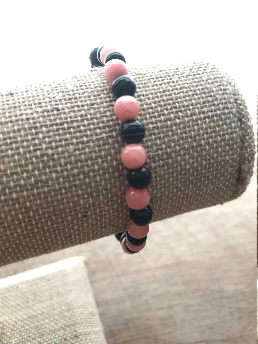 Excited to share the latest addition to my #etsy shop: Pink and Black Stone Lava Rock Bracelet etsy.me/2HYGvDm #jewelry #bracelet #no #unisexadults #diffuserjewelry #aromatherapyjewelry #diffuserbracelet #yogabracelet #essentialo