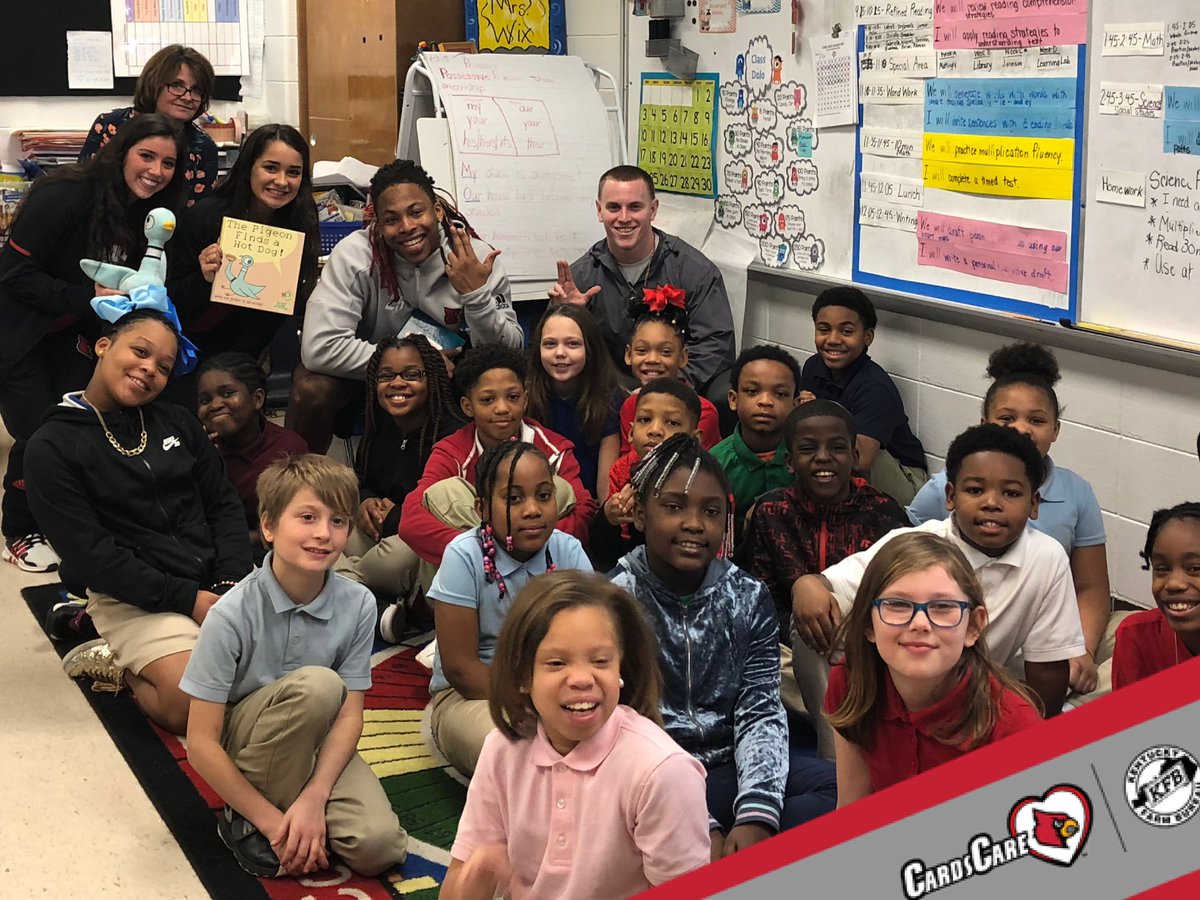 LouisvilleLCARE's tweet photo. .@UofLFootball &amp; .@CheerLouisville visited Cane Run Elementary today to share the importance of reading during Read Across America Week #CardsCARE #GoCards https://t.co/IldRBk2SZT
