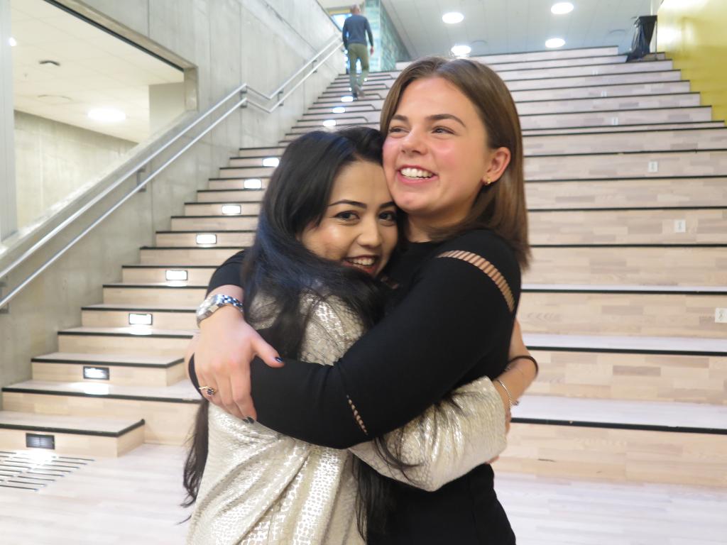 amnesty's tweet photo. Taibeh Abbasi, a high school student in Norway, hugs her best friend, Ingjerd. They live in fear of being torn apart. Any day now, Norway plans to deport Taibeh &amp; her family to Afghanistan. 

#TellNorway PM @Erna_Solberg to have a ❤️. #AbbasiStays → https://t.co/BsUqcpTEo9 https://t.co/GDWwINh5pO