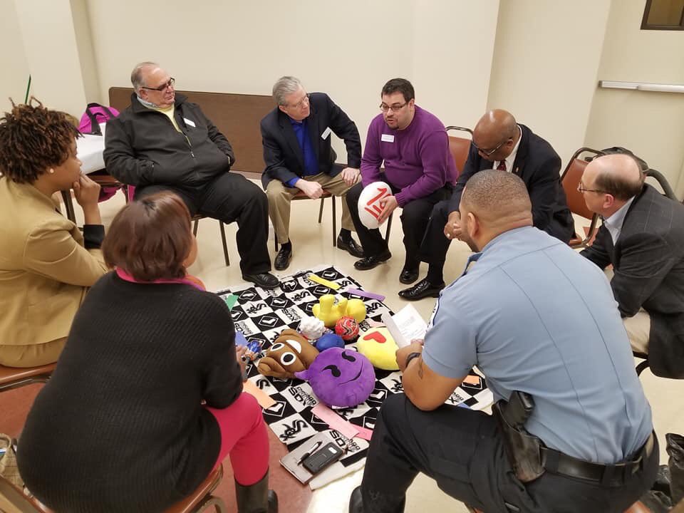 gcorrumc's tweet photo. For a church too long removed from on-the-ground ministry, a first step is listening. #GCORRboard engage in listening circle w law-enforcement officers, community organizers, clergy, social workers & educators who work together to advocate with & support people living in Chicago. https://t.co/JnhZluBGHp