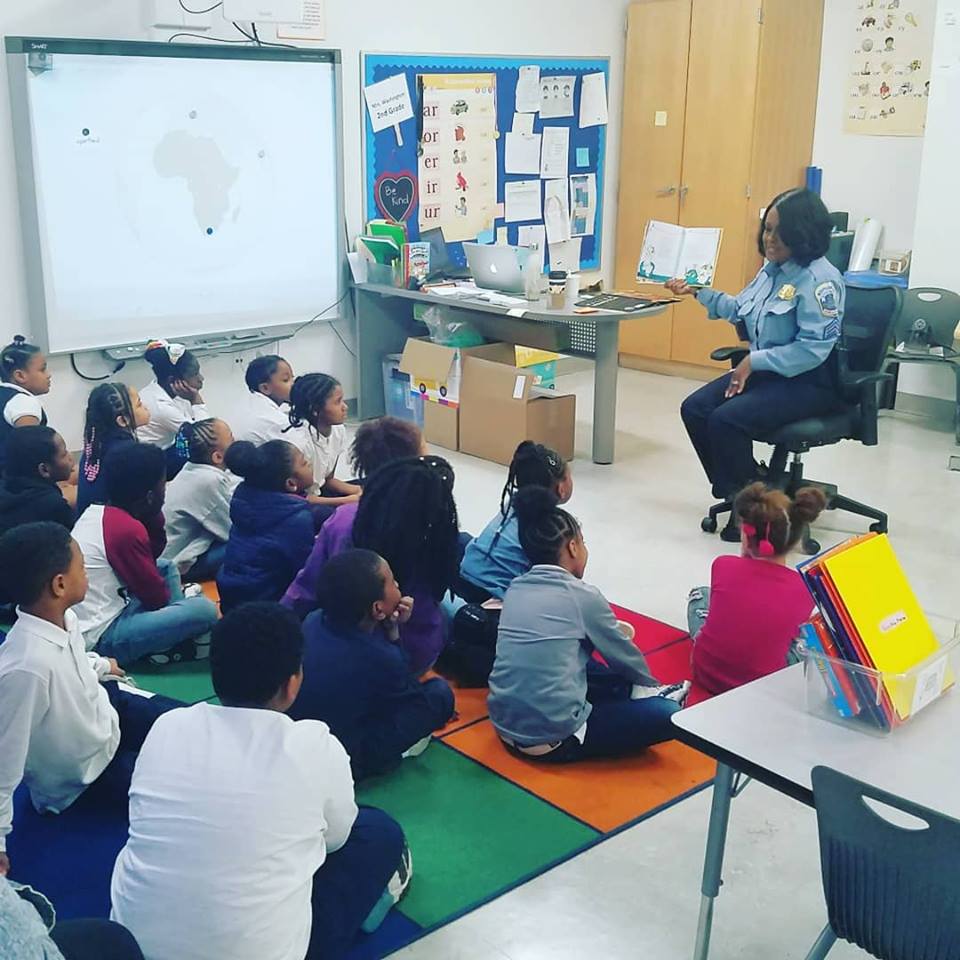DCPoliceDept's tweet photo. Told ya we'd be flooding your timelines... 

School Resource Officer, Sergeant Locita Dixon and George Dixon (with Housing Authority Police), read to the students at Payne Elementary School.

What's your favorite #DrSeuss book?

#ReadAcrossAmerica #DCPolice #HereToHelp https://t.co/PxKYCPpYUo
