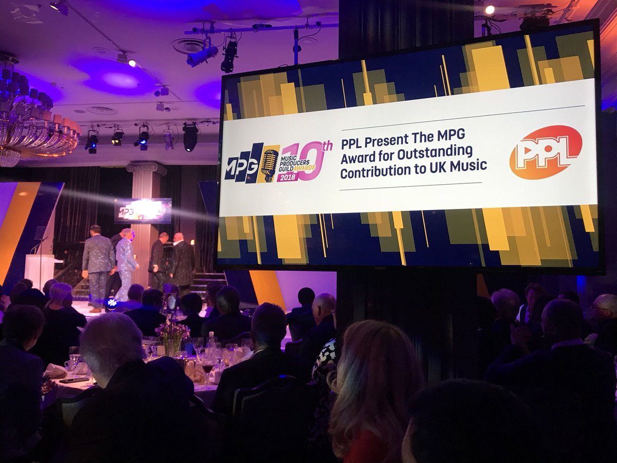 PPLUK's tweet photo. Massive congratulations to Clive Langer and Alan Winstanley, your contribution to UK Music truly is Outstanding. Here’s PPL CEO Peter Leathem presenting their award! #MPGAwards https://t.co/tkB5GvtQlk