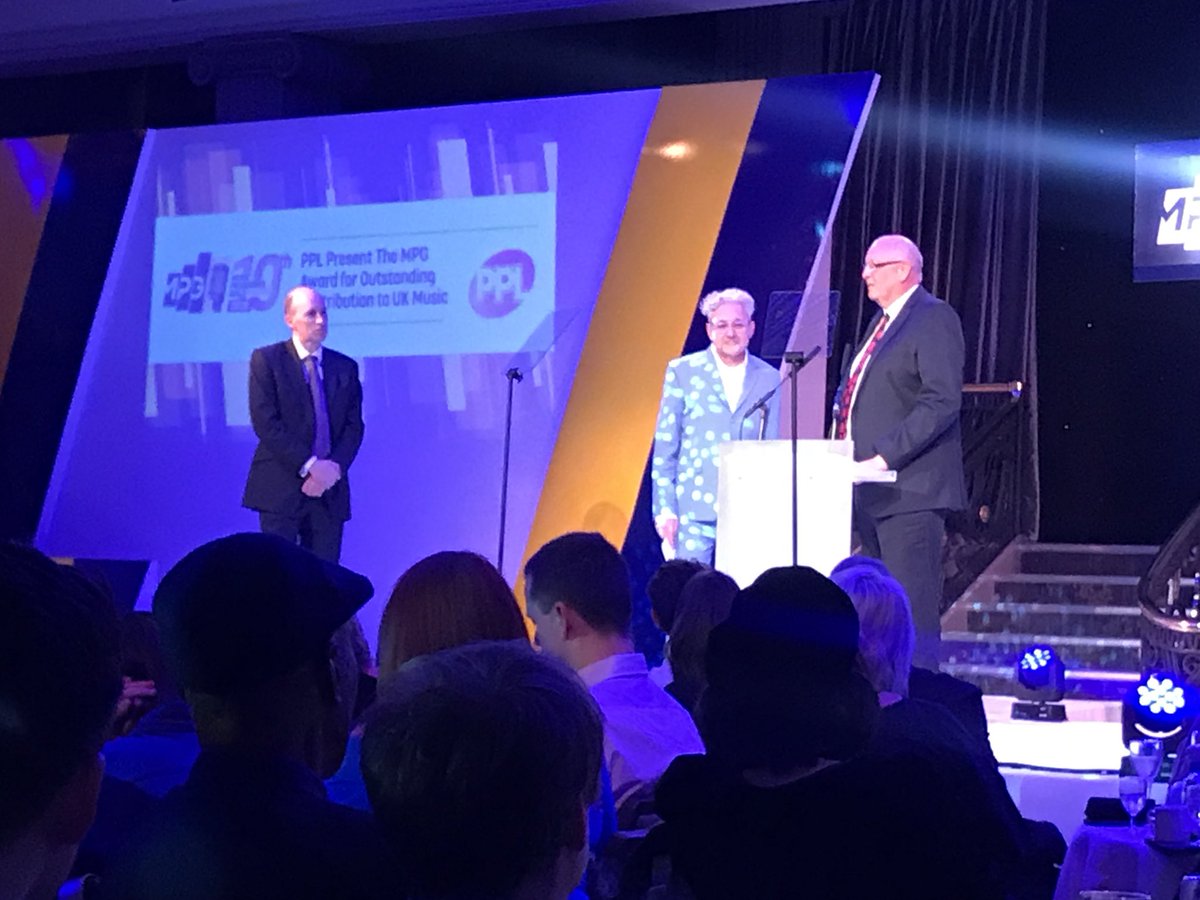 PPLUK's tweet photo. Massive congratulations to Clive Langer and Alan Winstanley, your contribution to UK Music truly is Outstanding. Here’s PPL CEO Peter Leathem presenting their award! #MPGAwards https://t.co/tkB5GvtQlk