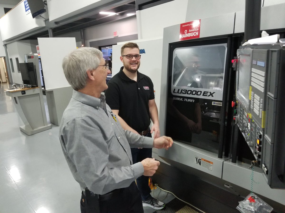 EspritEdge's tweet photo. We caught our Applications Engineer Chris Delwiche at Okuma’s Partners in THINC facility happily giving controller training to Okuma Applications Engineer Kevin Kraieski. #espritcam #okuma #partnersinThinc #dptechnology #camsystem #therightchoice
@PartnersinTHINC @OkumaAmerica https://t.co/GbilKP6Zae